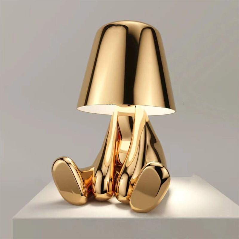 Petite lampe de table LED, figurine homme moderne, lumière d'ambiance pour décoration intérieure écoénergétique.