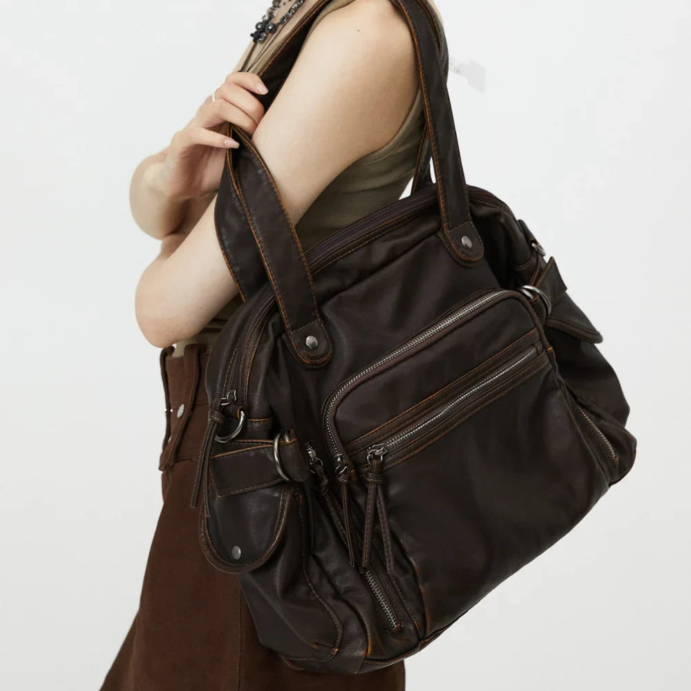 Grand sac de cours femme marron en cuir synthétique, cabas élégant et pratique pour étudiante ou usage quotidien.