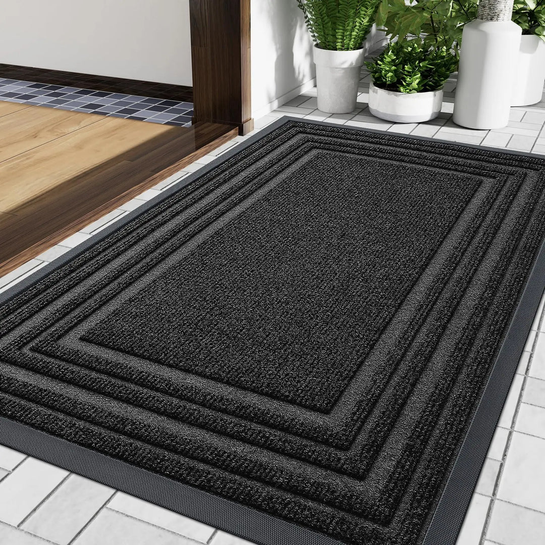 Tapis de sol en caoutchouc texturé, antidérapant, pour entrée principale. Protection contre saleté et humidité.