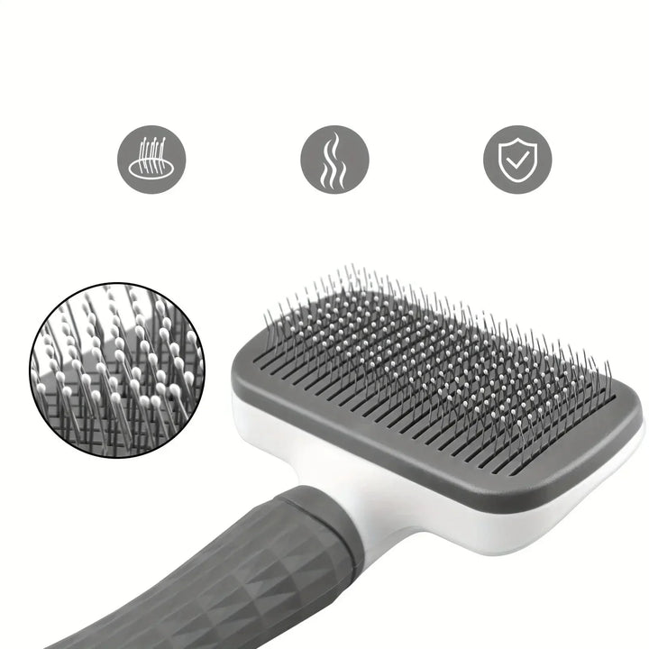 Vue produit: Brosse auto-nettoyante grise pour chiens et chats. Outil essentiel pour l'hygiène et le soin du pelage.