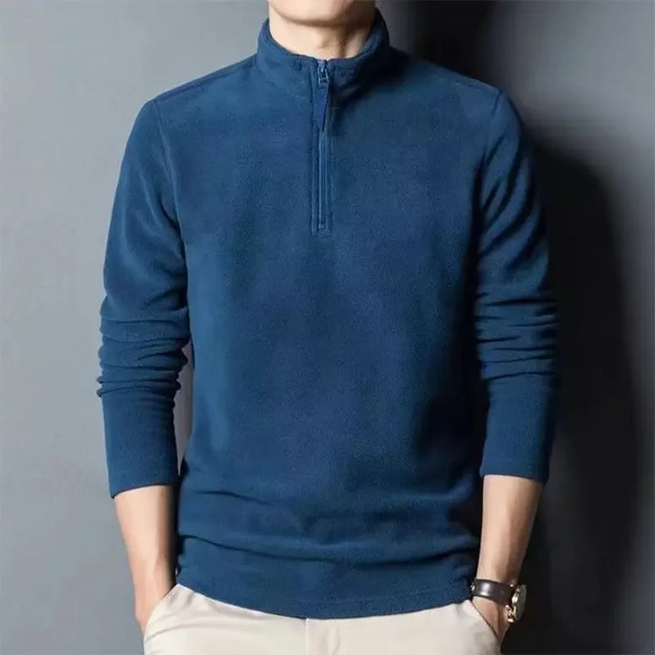 Pull demi-zip polaire homme pour une chaleur modulable, parfait pour le sport ou les activités extérieures.