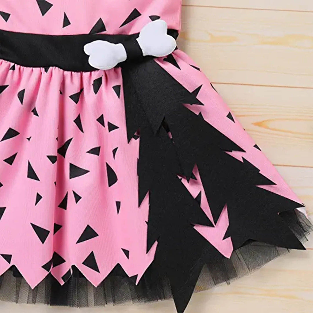 Déguisement enfant fille Pierrafeu. Robe verte/orange confortable. Idéal pour un anniversaire ou soirée à thème.