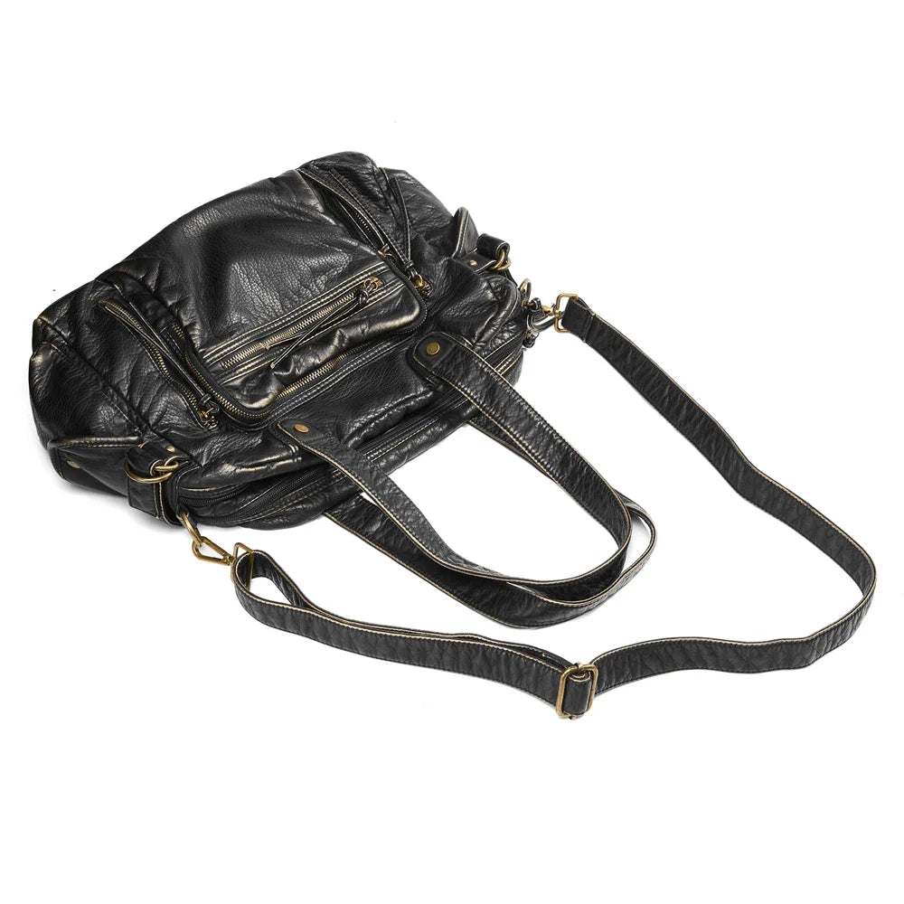 Sac à main femme vintage noir avec multiples compartiments pour organiser vos affaires de cours.