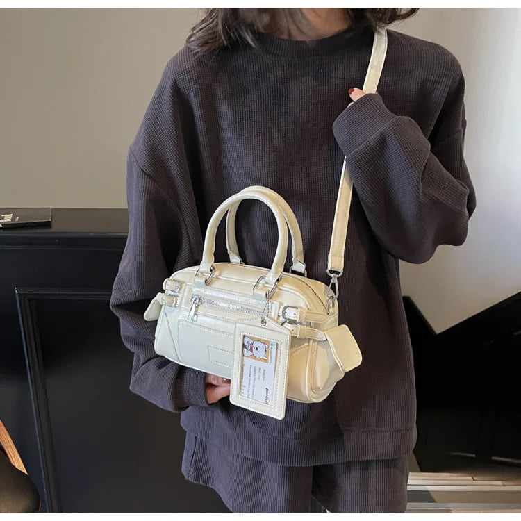 Petit sac à main Alméa élégant couleur crème, accessoire mode compact et pratique pour femme.