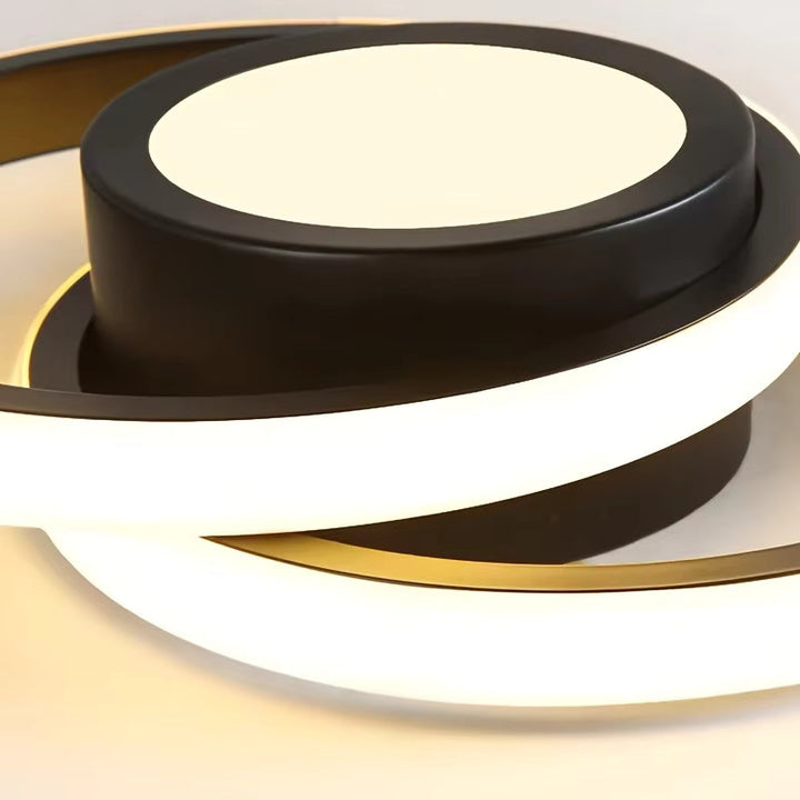 Luminaire LED élégant avec double anneau, plafonnier moderne et économe en énergie.