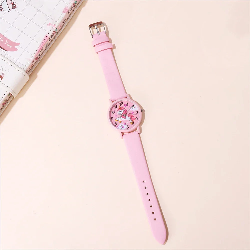 Montre licorne pour fille avec bracelet en cuir PU rose et motif dessin animé mignon. Apprendre l'heure ludique.