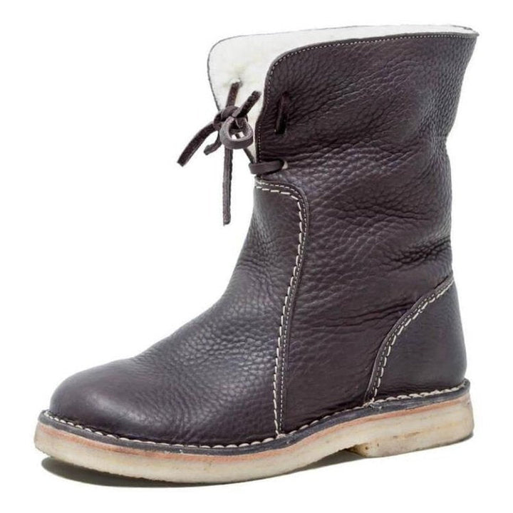Bottes femme tendance, imperméables pour l'hiver, alliant style, chaleur et protection maximale.