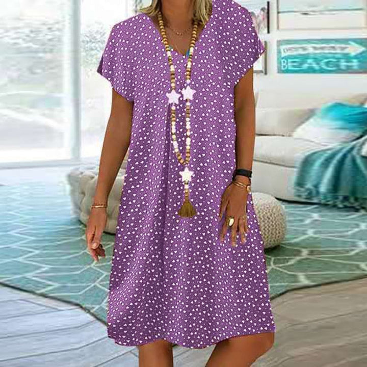Robe midi femme élégante pour le quotidien. Style estival fluide et confortable. Parfaite pour les vacances.