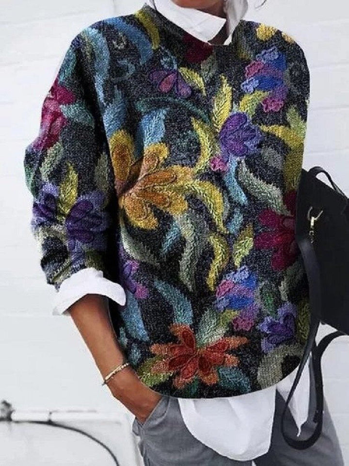 Pull femme chaud à motif floral vibrant et touches tigre, parfait pour un confort douillet en hiver.