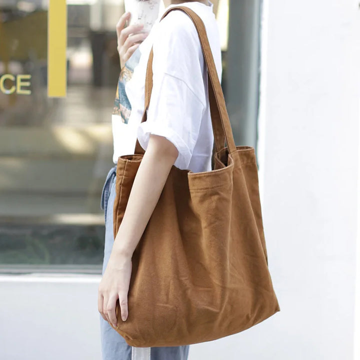 Sac de plage ou cabas EleganzaCarry en toile, style décontracté et minimaliste pour l'été.
