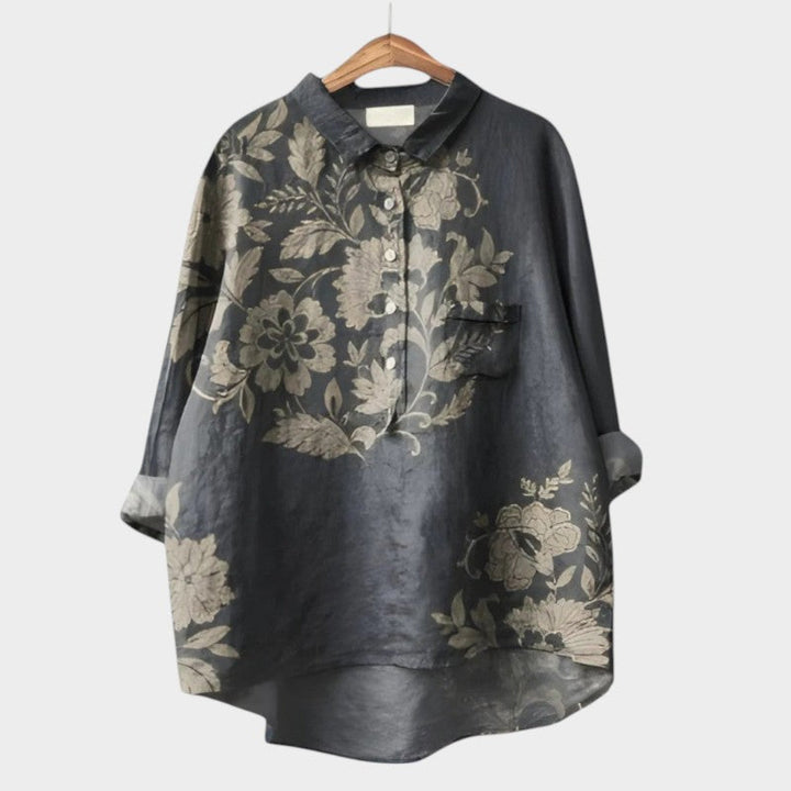 Blouse Nola fleurie femme, motif nature délicat, style décontracté chic, idéale pour l'été.