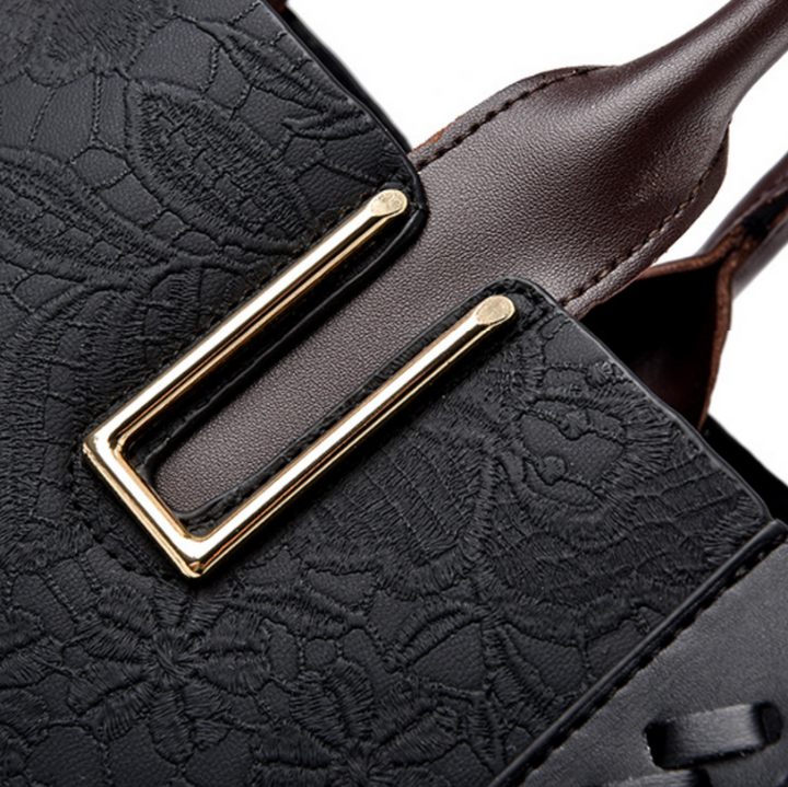 Sac à main de luxe en cuir noir, accessoire élégant et spacieux, parfait pour le quotidien féminin.