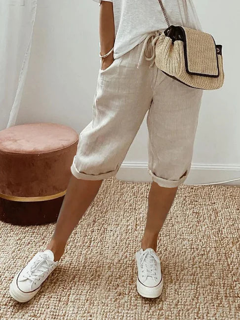 Pantalon fluide femme taille haute, vêtement léger et mode, parfait pour le confort aérien en été.