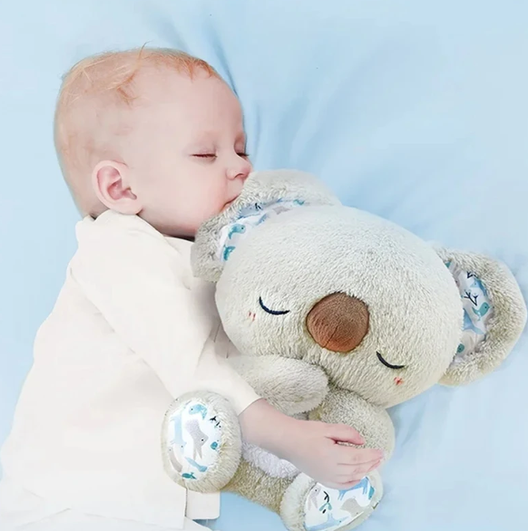 Peluche koala apaisante avec thérapie haptique. Aide à la respiration rythmique et au sommeil réparateur.
