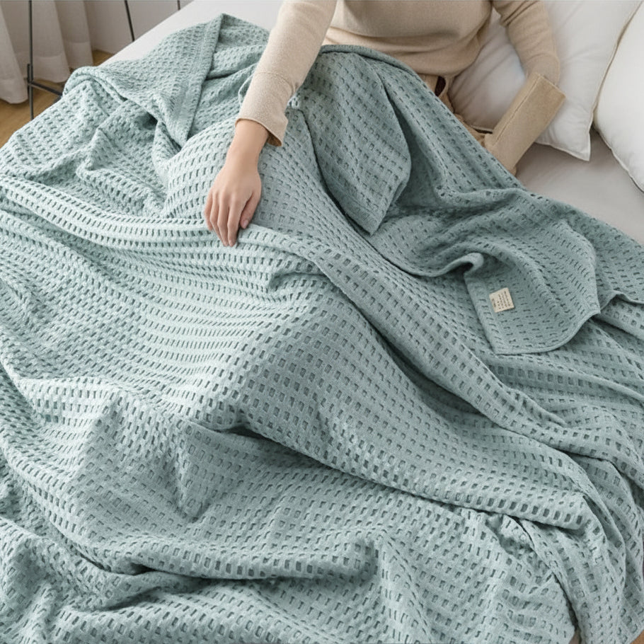 Plaid Cloudweave confortable et polyvalent, texture gaufrée, parfait pour le salon ou comme jeté de lit.