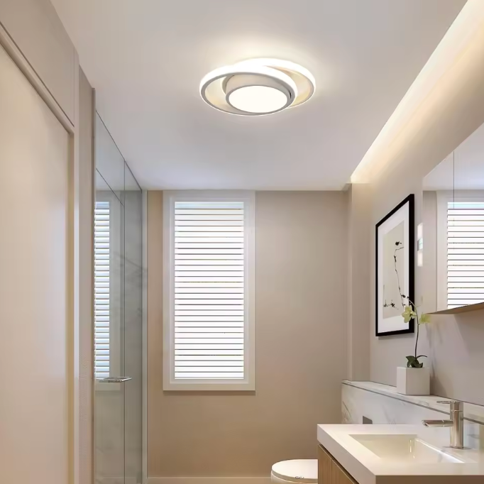 Luminaire de plafond LED, double anneau, esthétique moderne et éclairage performant.