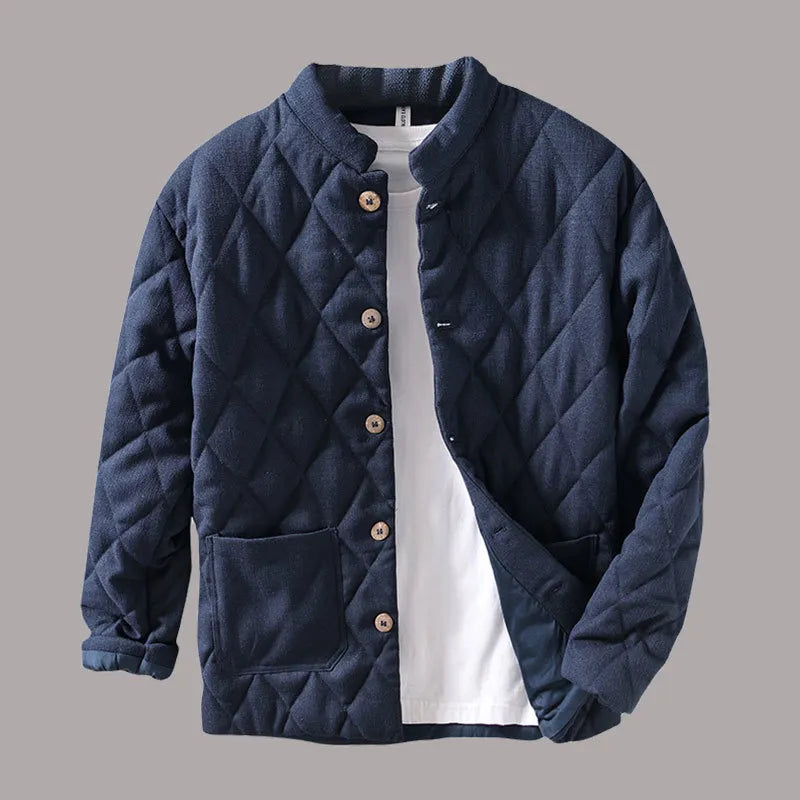 Veste légère homme grise, matelassée, élégante. Idéale pour un look urbain et confortable.