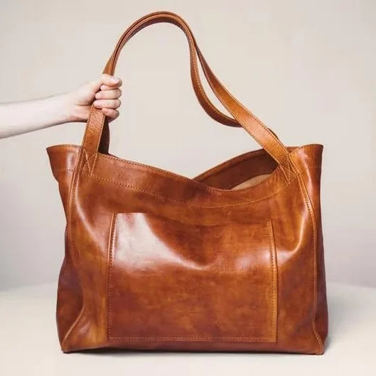 Accessoire mode Elegancia, grand sac fourre-tout vintage chic pour femme élégante.