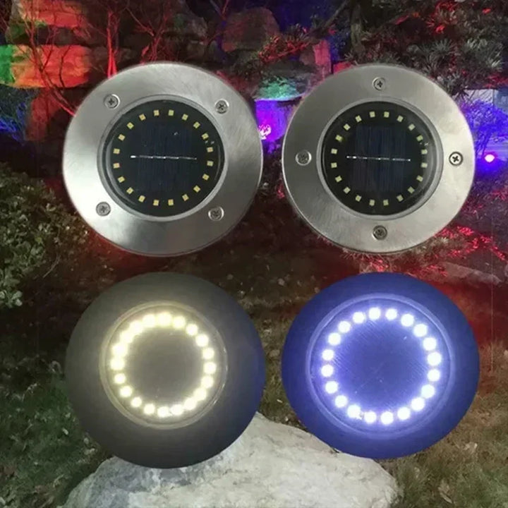 Lampe de sol LED solaire ronde en inox, étanche, pour un éclairage extérieur autonome et décoratif de jardin.