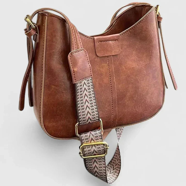 Sac à bandoulière femme, à la fois sac à main, élégant et pratique pour le quotidien ou les sorties.