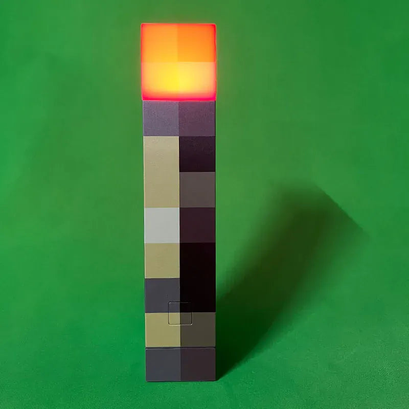 Lampe veilleuse LED Pixel multicolore, rechargeable USB. Idéale comme jouet lumineux ou décoration enfant.