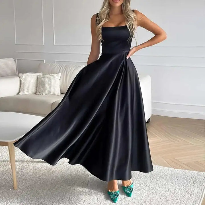 Robe maxi évasée élégante pour femme, idéale invitée mariage, soirée ou cérémonie. Tissu fluide, coupe flatteuse.