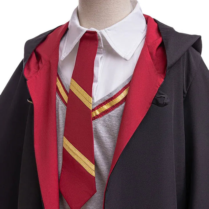 Costume d'enfant rayé et original pour Halloween, parfait pour incarner un personnage mystérieux.