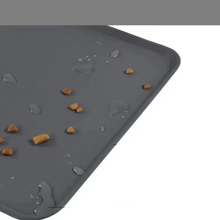 Tapis de gamelle en silicone antidérapant pour chien et chat. Protection du sol et facile à nettoyer.