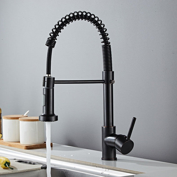 Mitigeur de cuisine avec douchette à ressort extensible, haute performance.