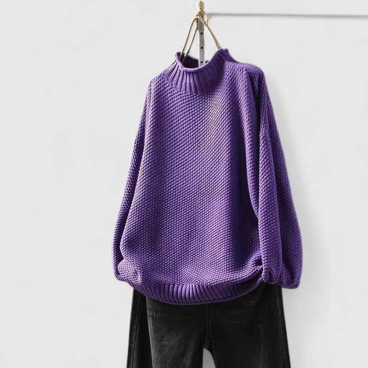 Pull femme Suzi élégant, texture raffinée, confort optimal, pour une mode décontractée chic.