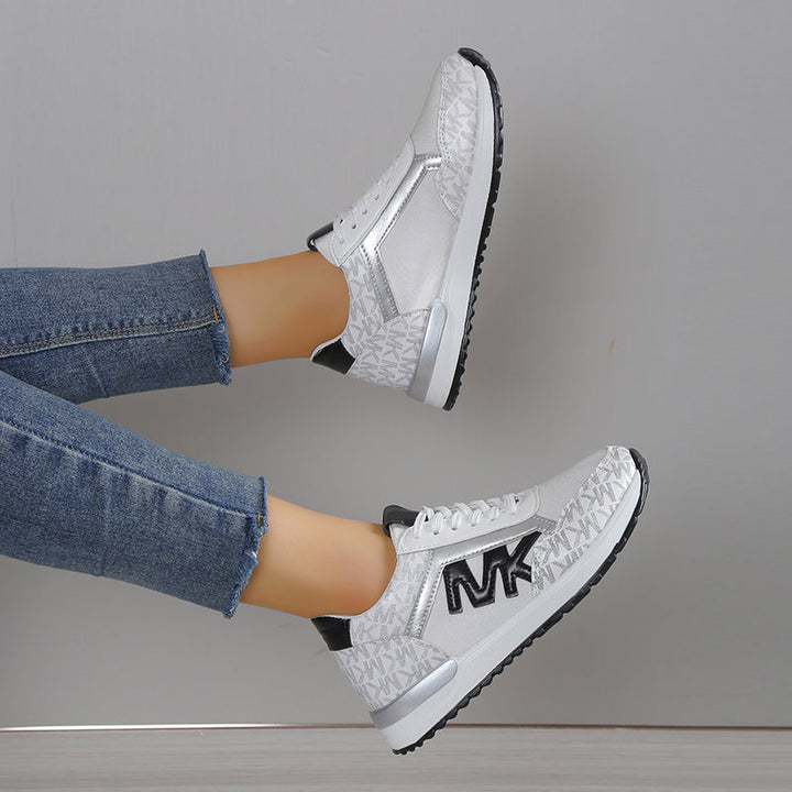 Baskets femme légères et confortables, parfaites pour la marche ou les activités sportives douces.
