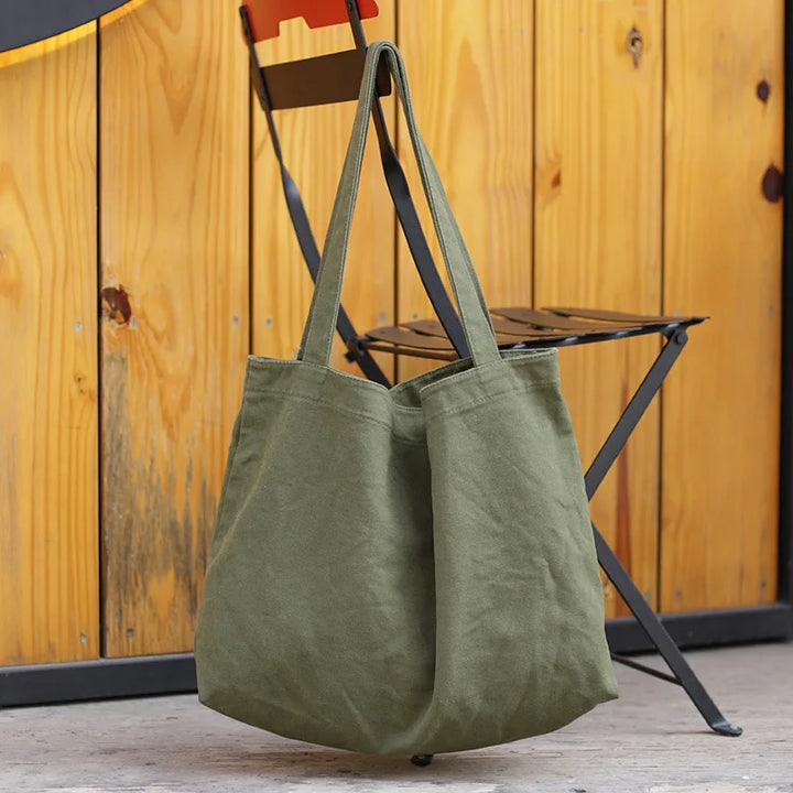 Sac cabas EleganzaCarry en toile beige minimaliste pour femme, idéal shopping ou quotidien.