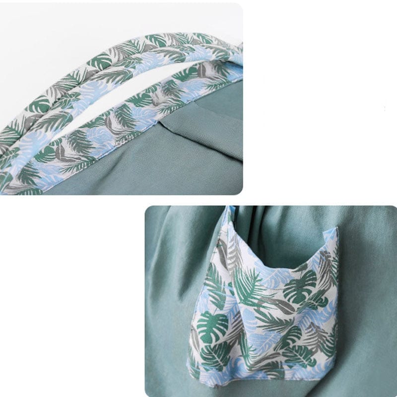 Bébé serein en sécurité dans une écharpe de portage ergonomique respirante en tissu maillé. Confort optimal.