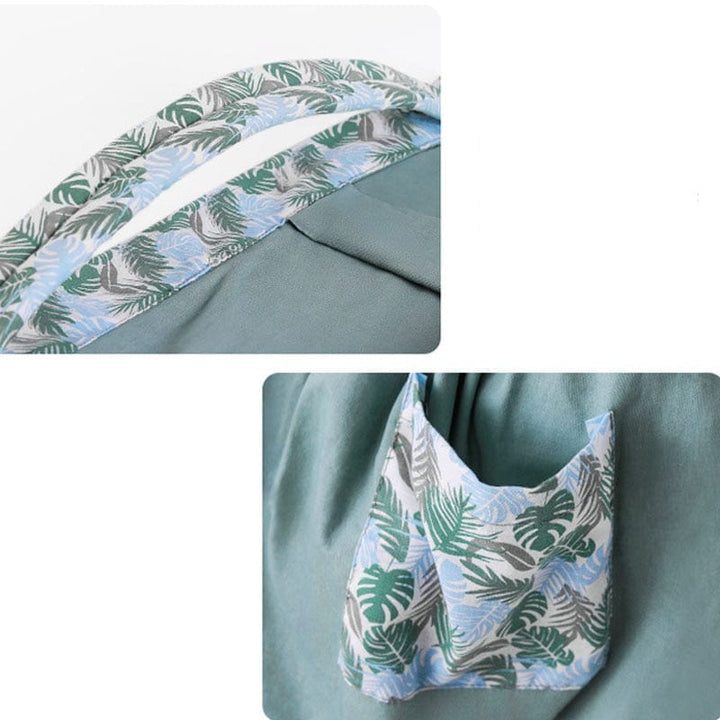Bébé serein en sécurité dans une écharpe de portage ergonomique respirante en tissu maillé. Confort optimal.
