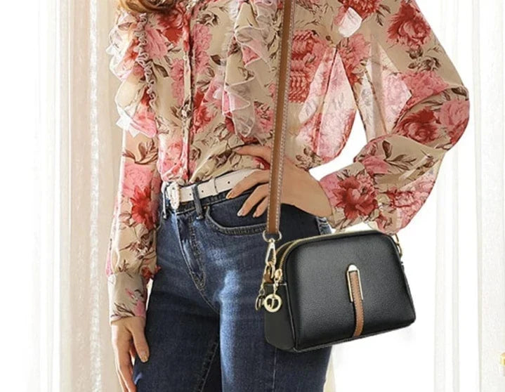 Sac à main élégant pour femme, cuir vegan durable, style intemporel et fonctionnel.