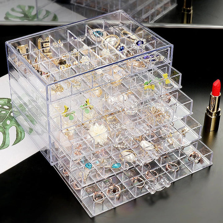 Organisateur acrylique chic et fonctionnel pour bijoux divers : boucles d'oreilles, bagues, colliers. Idée cadeau parfaite.