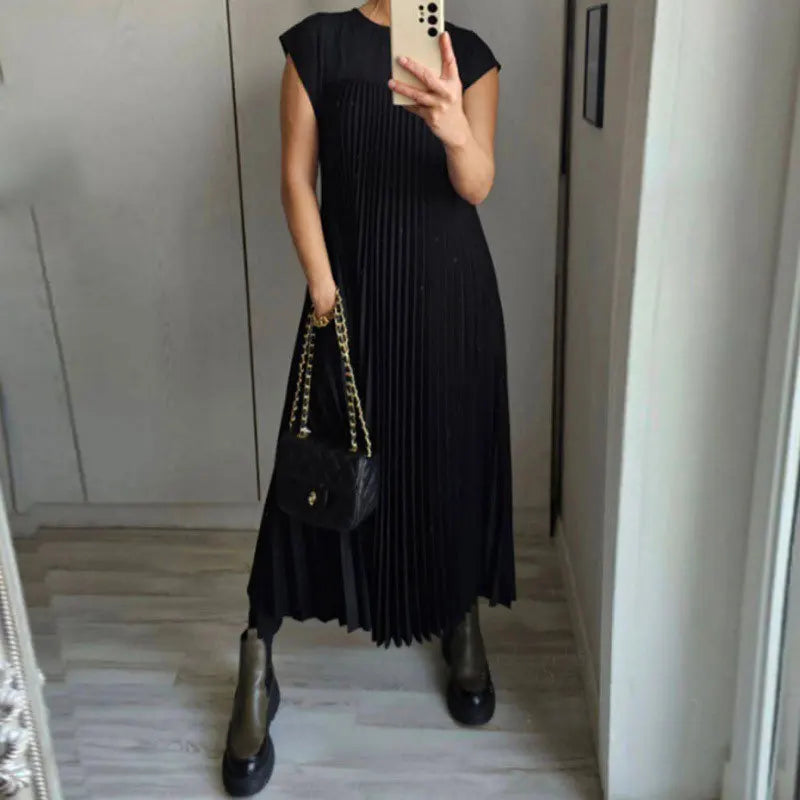 Robe femme Tamara plissée maxi, chic et polyvalente pour tenue de soirée ou quotidienne. Mode féminine raffinée.