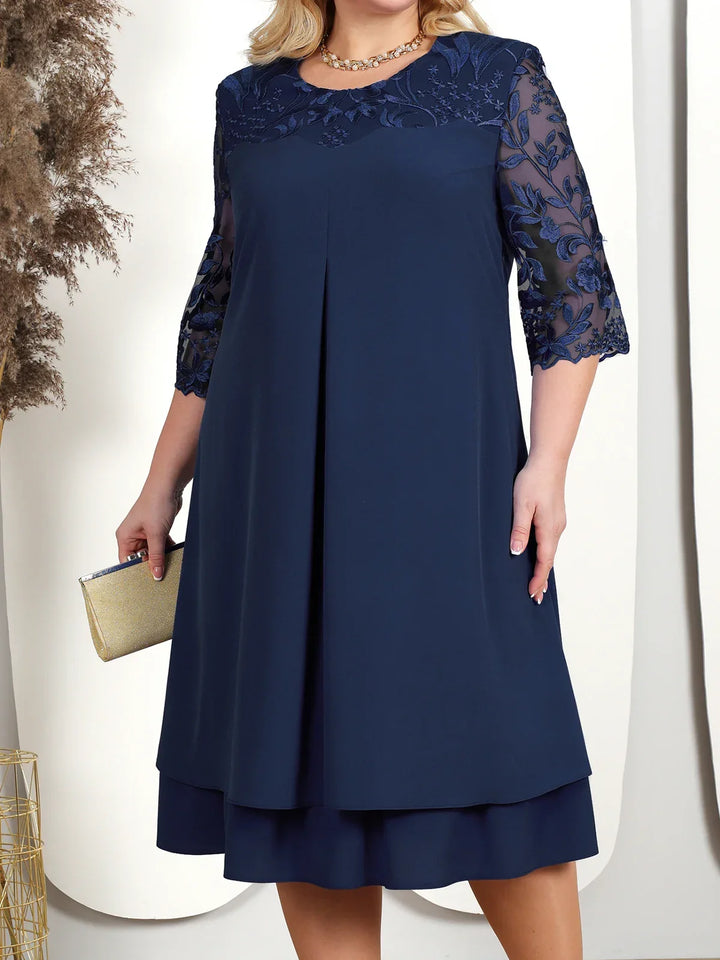 Robe longue fleurie brodée grande taille pour femme. Coupe élégante, style automnal, parfaite pour soirées chics.