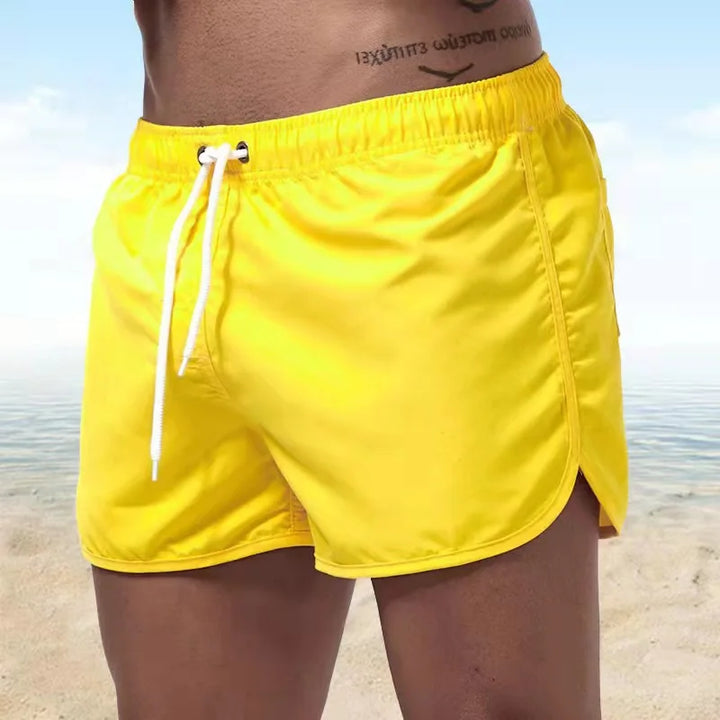 Short de bain homme léger à séchage rapide. Parfait pour activités aquatiques, plage et piscine d'été.
