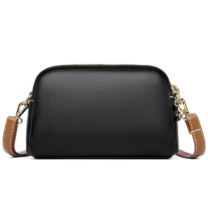 Sac chic femme en cuir vegan, couleur crème, accessoire tendance et pratique pour l'été.