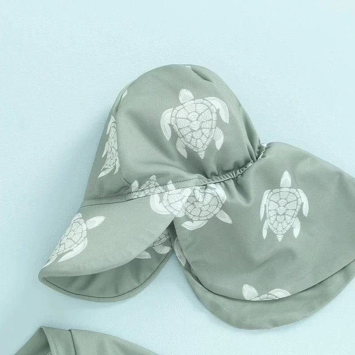 Maillot bébé anti-éruption garçons, motifs dinosaures et tortues, manches longues. Idéal pour la natation et le soleil.