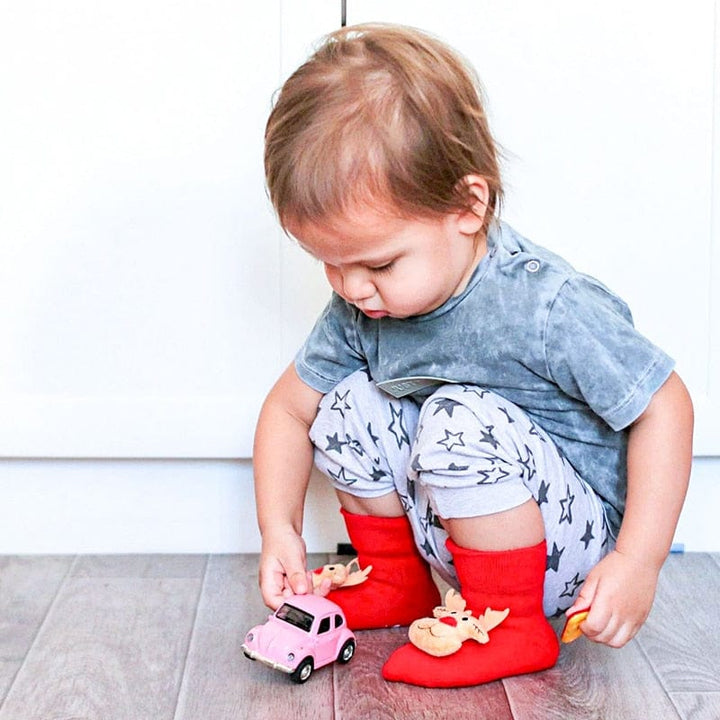 Chaussons bébé antidérapants pour l'hiver, protégeant les pieds des tout-petits pour Noël.