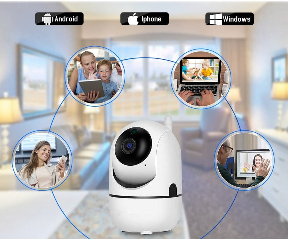 Parents rassurés regardant leur bébé via l'écran du babyphone connecté, profitant de la surveillance vidéo domestique.