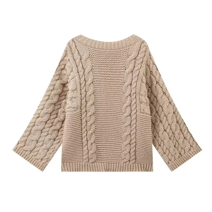 Pull femme hiver, tricoté maille épaisse. Coupe oversize confortable, idéal pour un look élégant et décontracté.