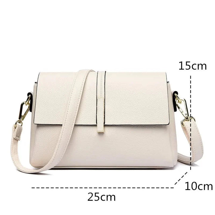 Sac à main femme besace bleu en cuir PU, couleur tendance. Accessoire de mode pour un style affirmé.