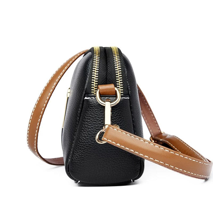Sac à main organisateur pour femme, cuir vegan noir, pratique, élégant et spacieux.
