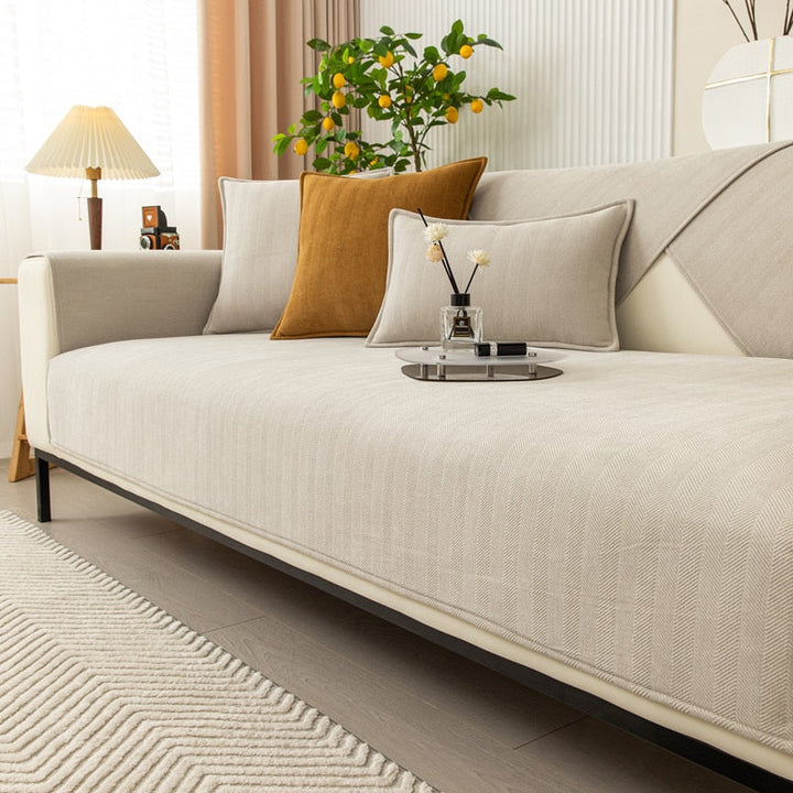 Housse de canapé moderne et élégante, transformant l'intérieur de votre salon avec un style raffiné en polyester.