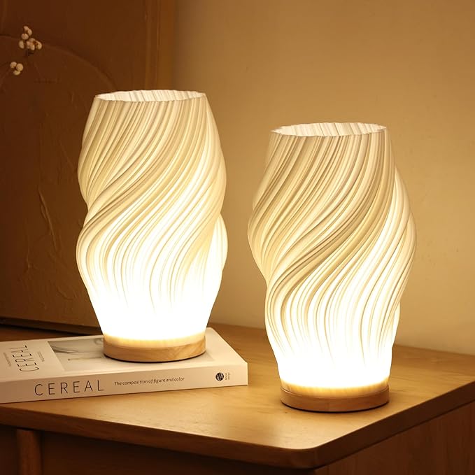 Superbe lampe de table LED avec design ondulé, idéale pour chambre ou bureau.