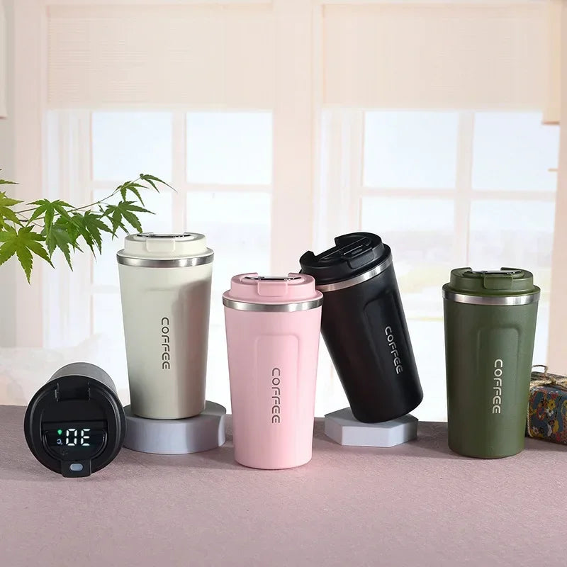 Thermos isotherme portable en inox pour boissons chaudes ou froides, design élégant et durable.
