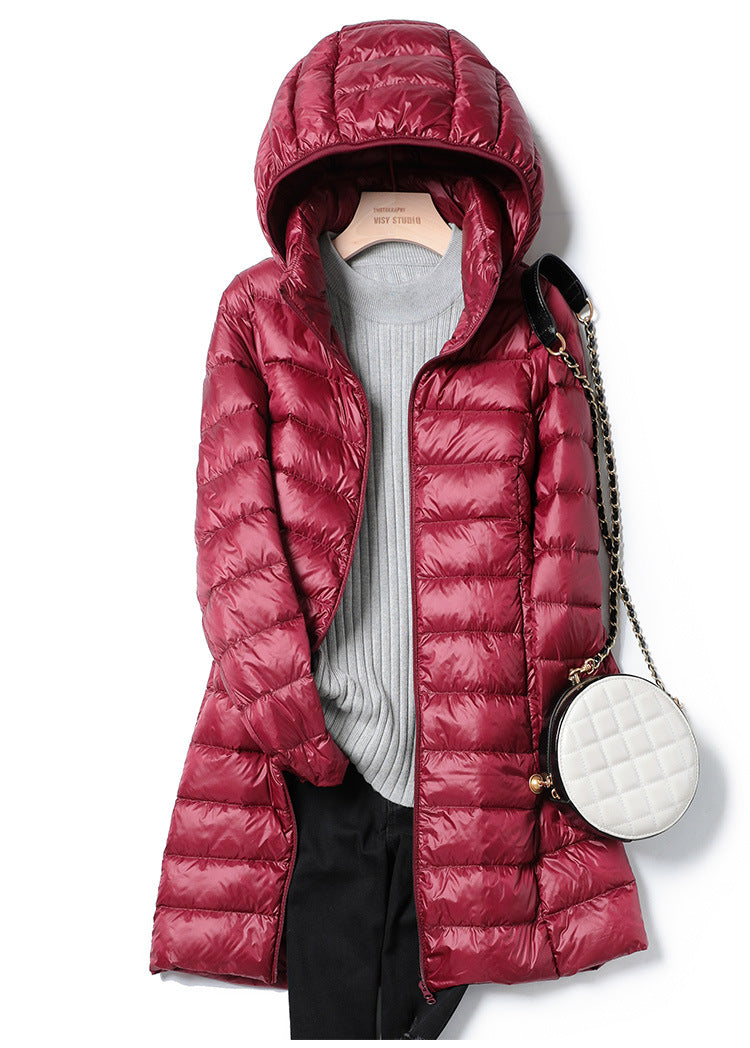 Veste femme polyvalente, duvet ultra-léger, chaude et élégante pour toute saison.